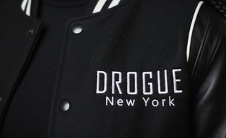 DROGUE NEW YORK UNISEX BLACK OUT VARSITY